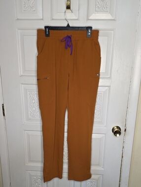 Figs Technical Collection in Orange/Rust with Purple Drawstring Size L/T